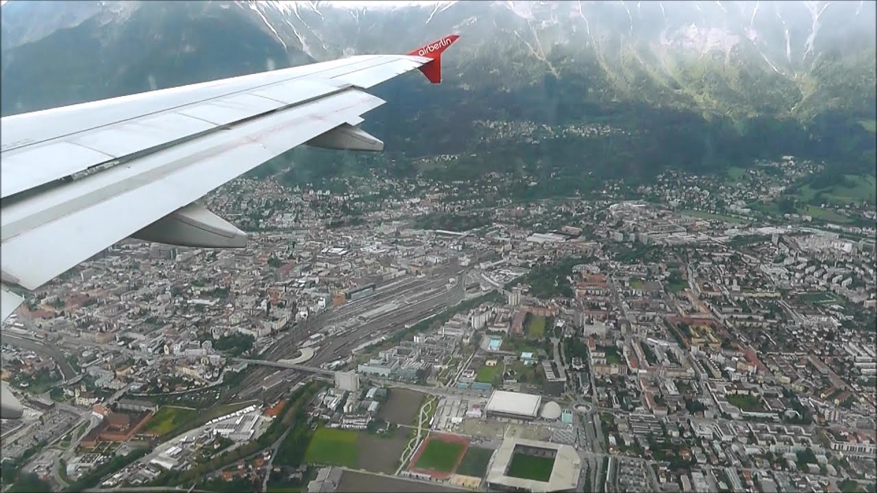 Wing view! Niki Airbus A319 [OE-LND] visual circling runway 08 in Innsbruck