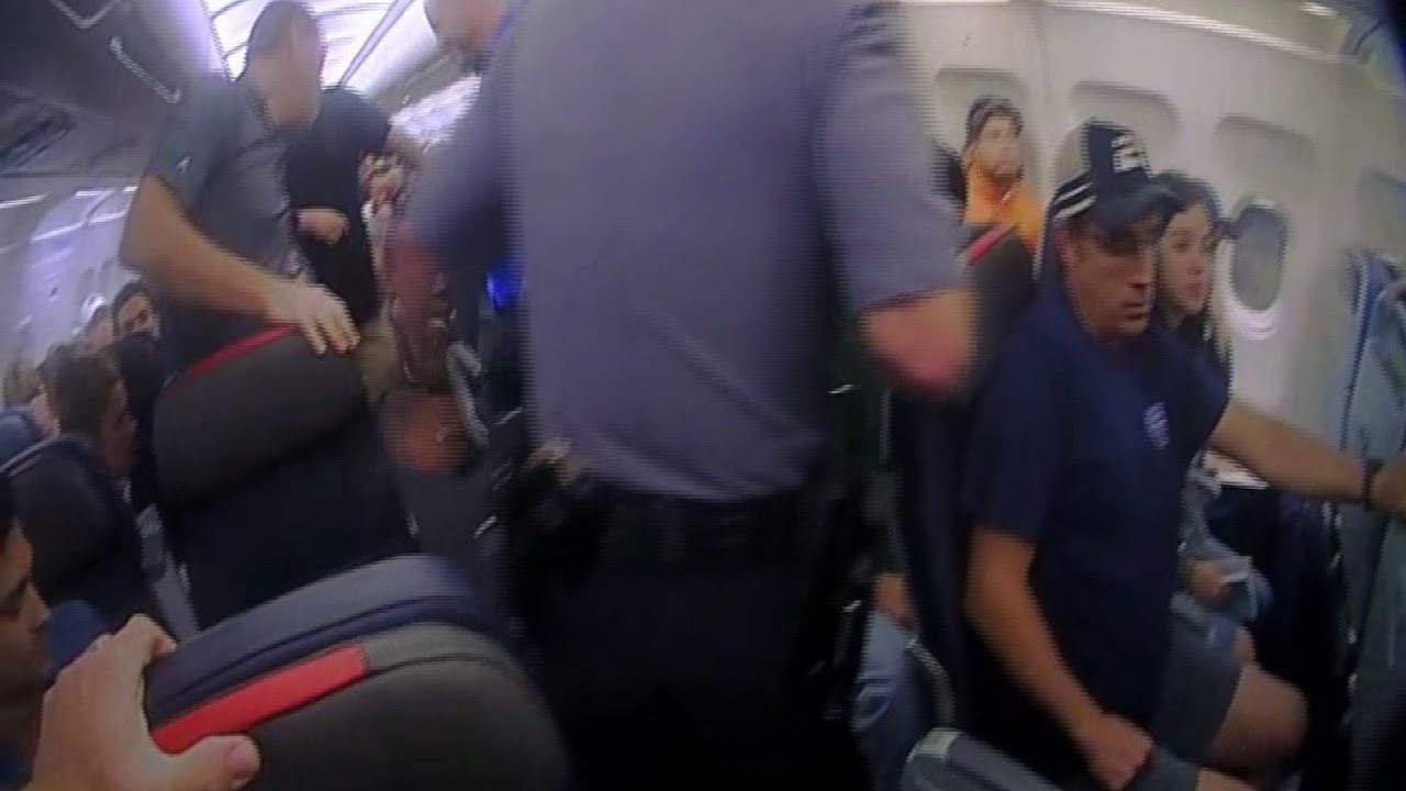 Body Camera Video Shows Unruly Passenger Being Removed from Plane