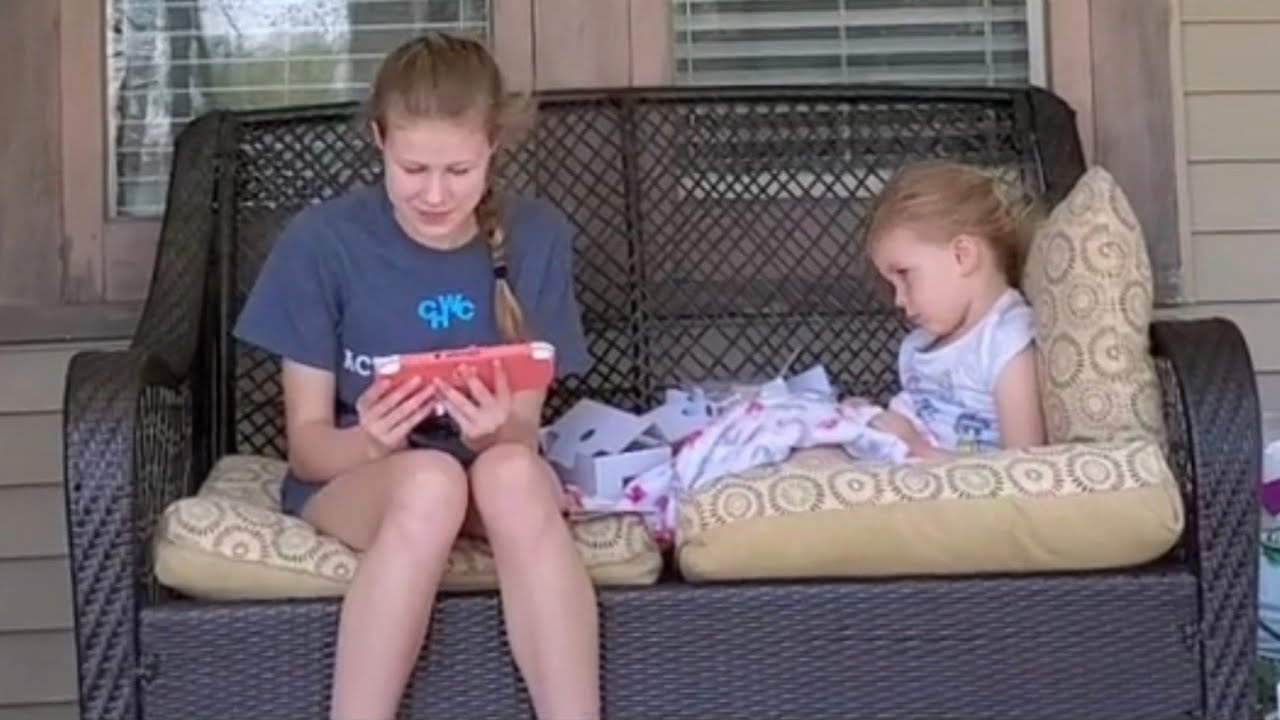 Unboxing the Nintendo Switch Lite with our neighbors (As a surprise gift to them).