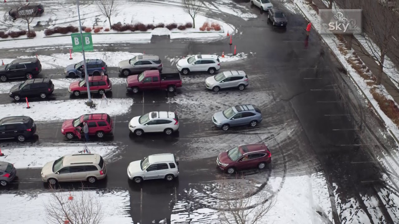 DRONE FOOTAGE: Lines circle Spokane Arena for COVID-19 vaccine clinic