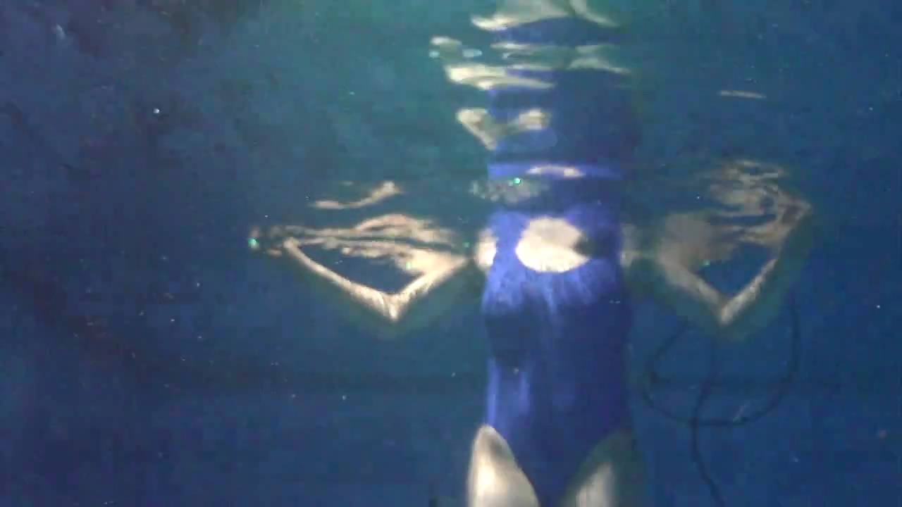 German lady swimming underwater