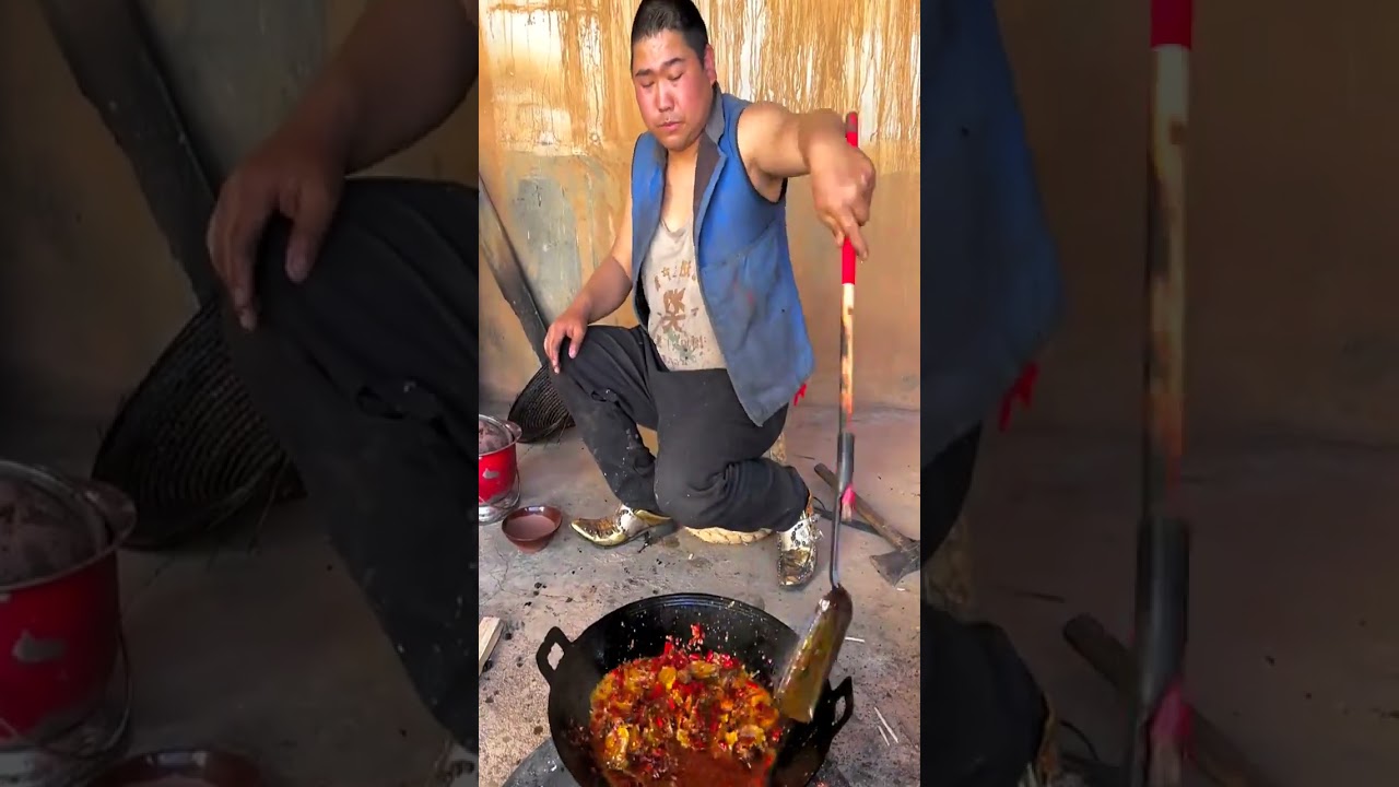 A Korean chef making delicious​ belly of pig with super chili 