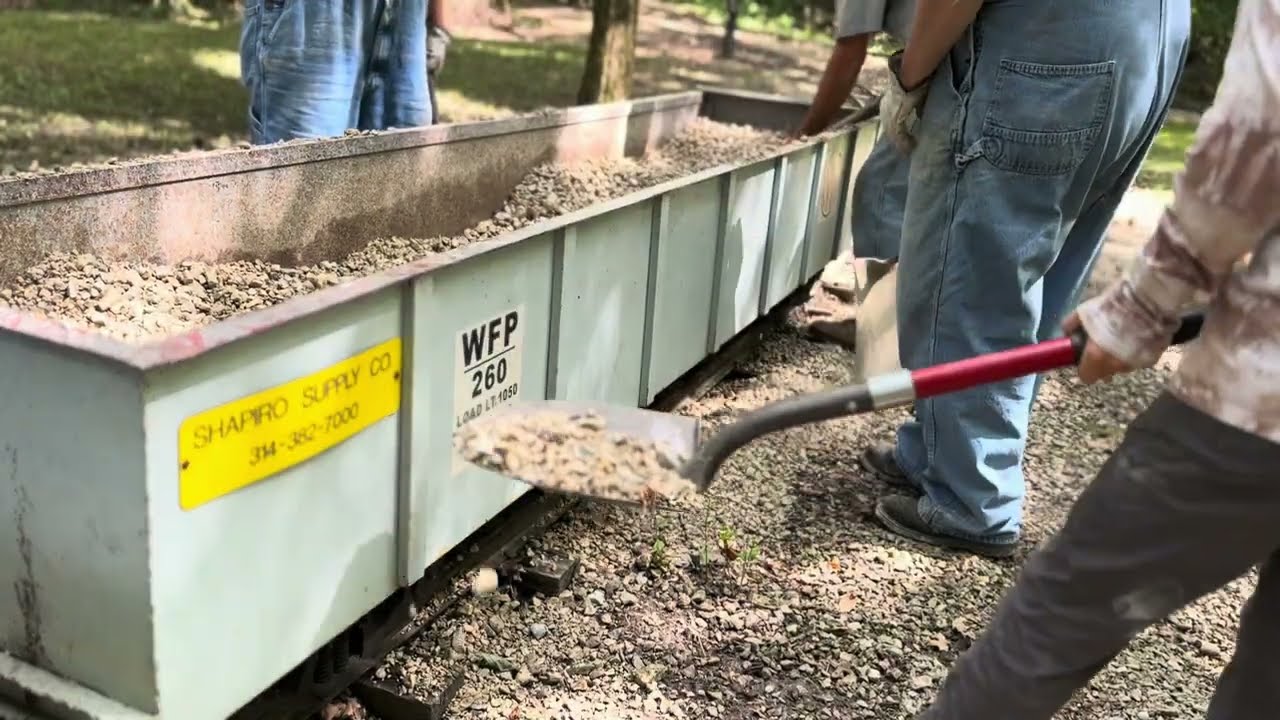 Fixing Track Damage at Wabash, Frisco and Pacific Railway After Heavy Rains
