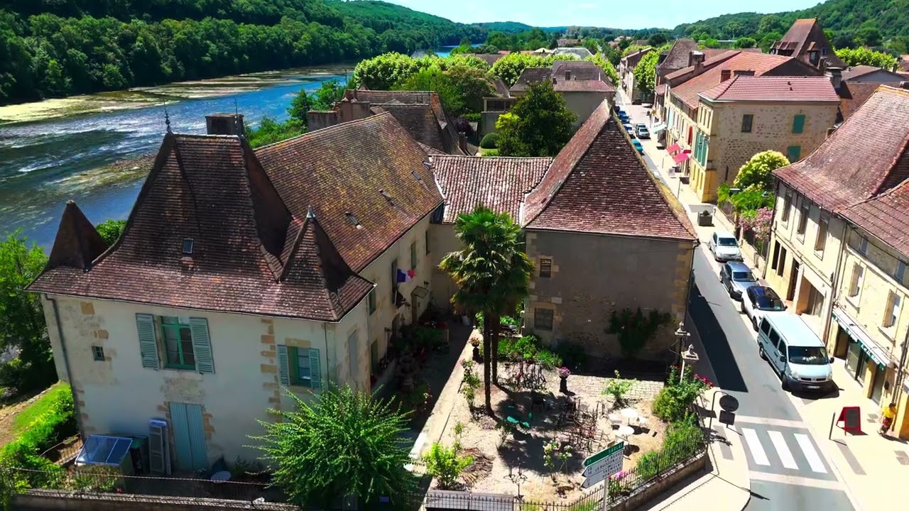 Drone shots of a French village next to a river - HDR 4k