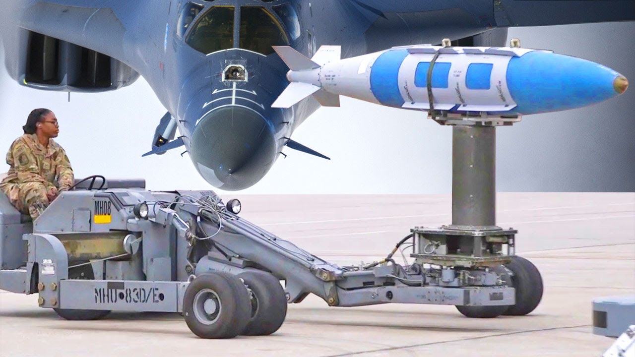 Air Force Weapons Loaders Arm US B-1 Lancer Aircraft