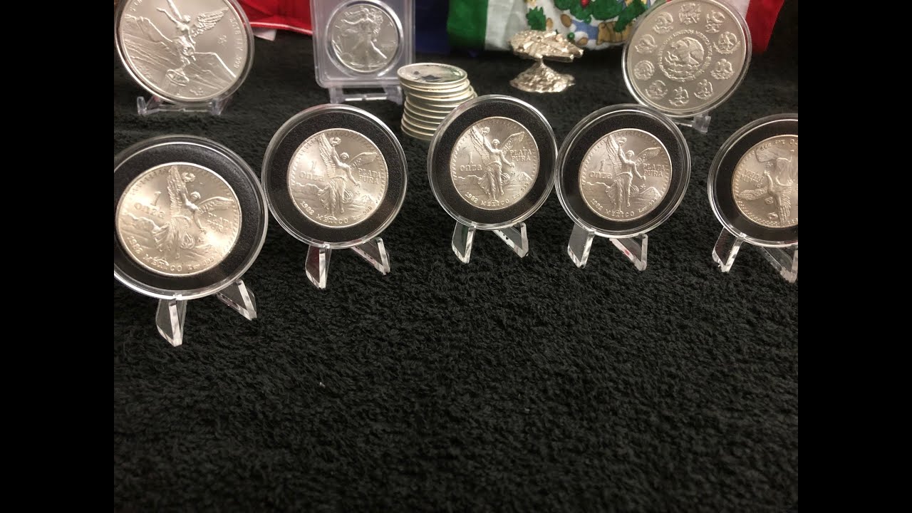 WHY I'M BUYING SILVER MEXICAN  LIBERTADS 5 oz's 1982 BU