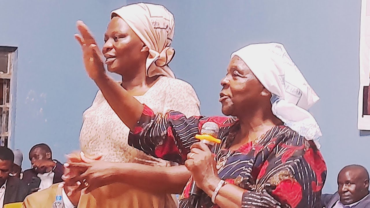 A76YRS OLD MAMA EPHA MAGUMBA SINGING HOT AFRICAN PRAISES IN PAG KIBERA DISTRICT WOMEN FELLOWSHIP