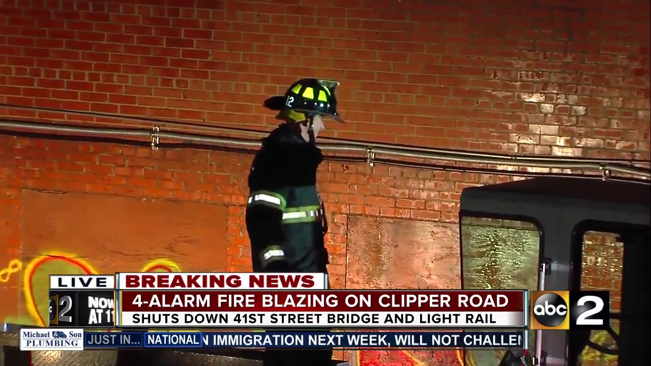 Firefighters battle 4-alarm fire in Woodberry