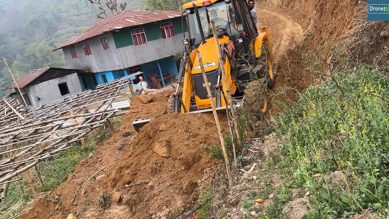 Saving Mountain Village Houses and Farms-Narrow Mountain Road Work with JCB Backhoe