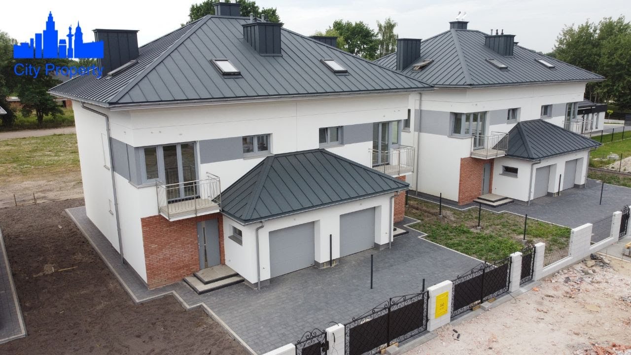 Bliźniak z garażem i wysokim poddaszem