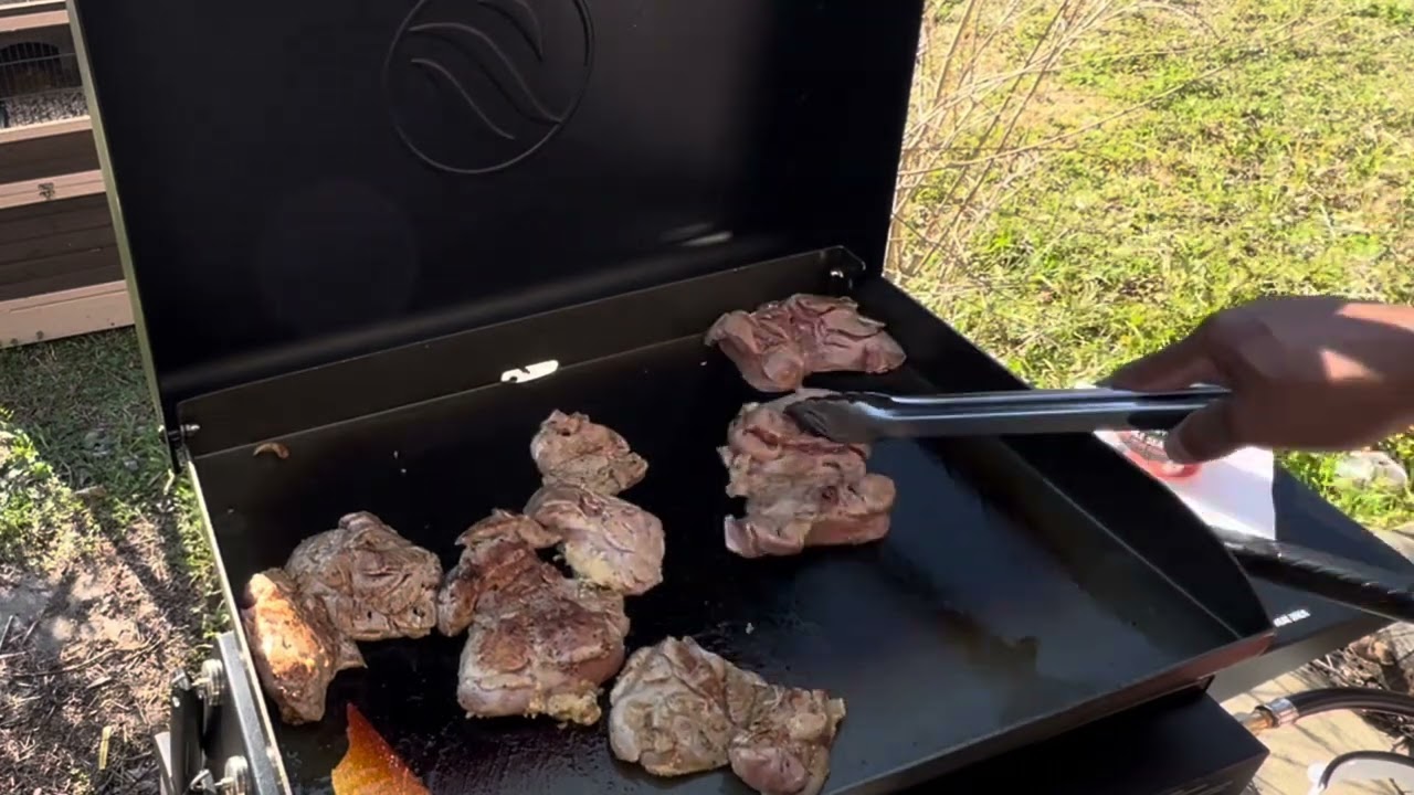 Blackstone 22” Griddle Cooking chopped cheddar chicken and onion flips