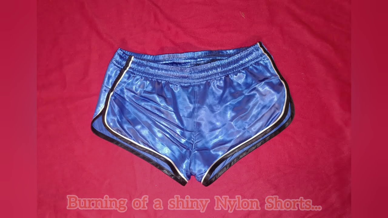 Blue glossy Nylon Shorts burning in my stove.. 🔥🔥🔥