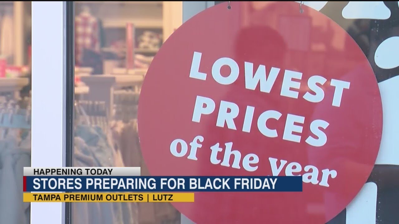 Hundreds of people shop for Black Friday at Tampa Premium Outlets