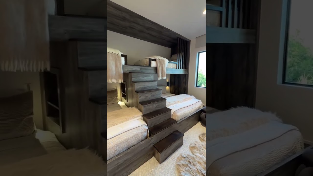I love the layout of this bunk room and the larger size beds down below  seems so smart!