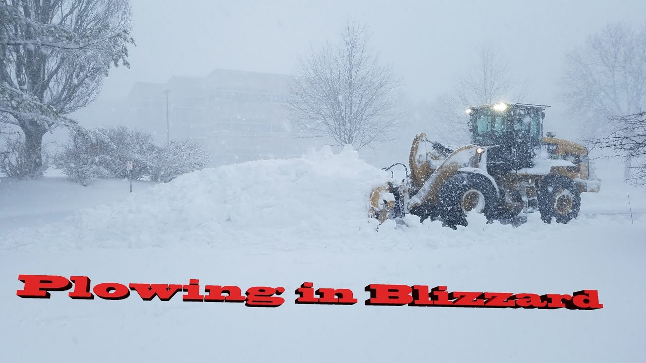 Cat 926M+MetalPless Plowing Parking Lot In Blizzard