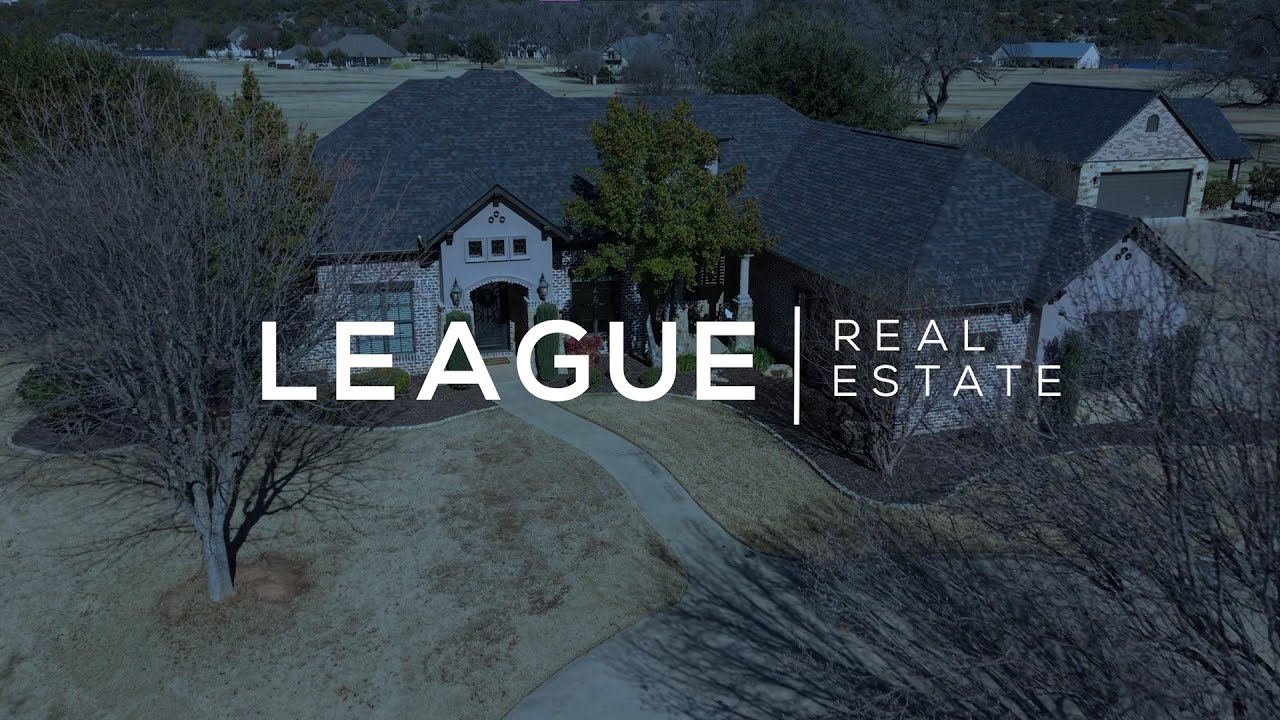 Lakefront Living in the Prestigious Peninsula Community of Granbury! | LEAGUE Real Estate