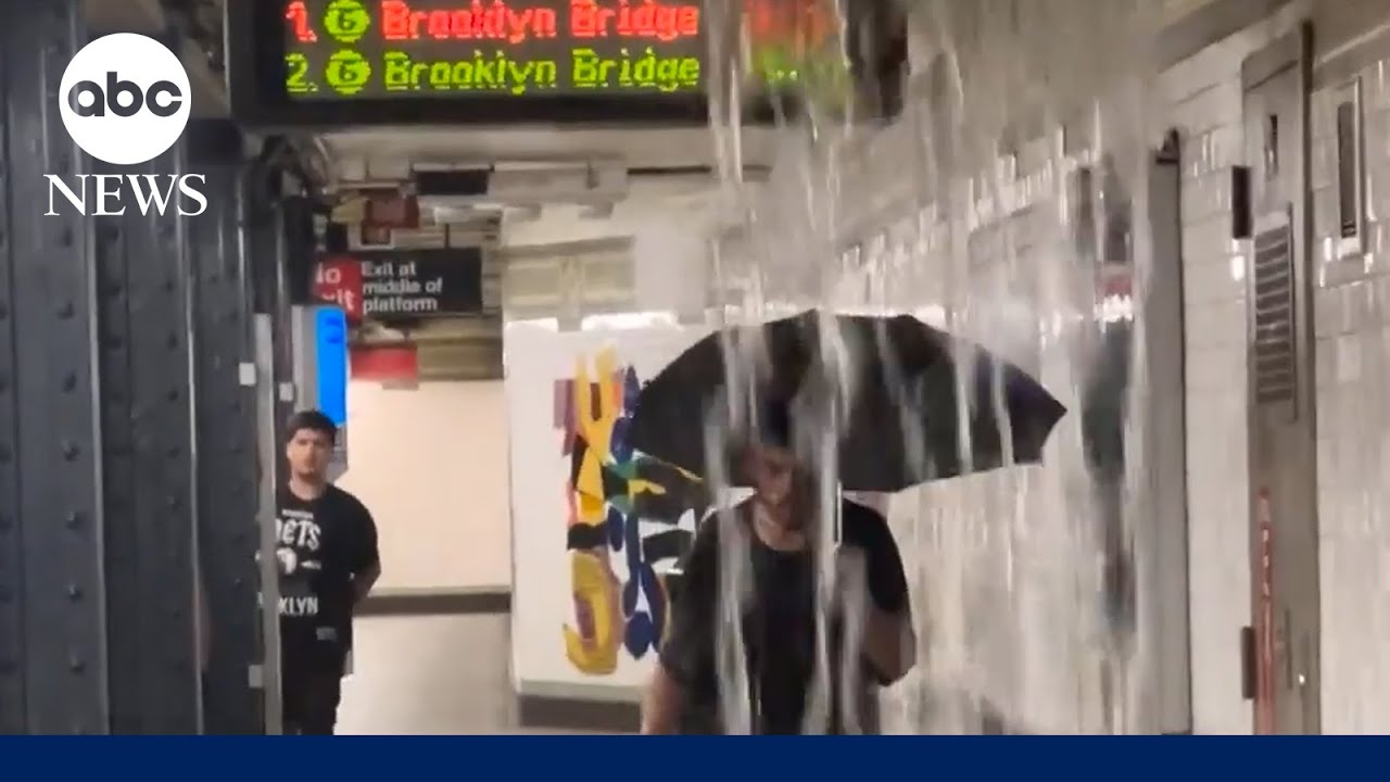 Water pours into New York City subway stations as storms hit Northeast