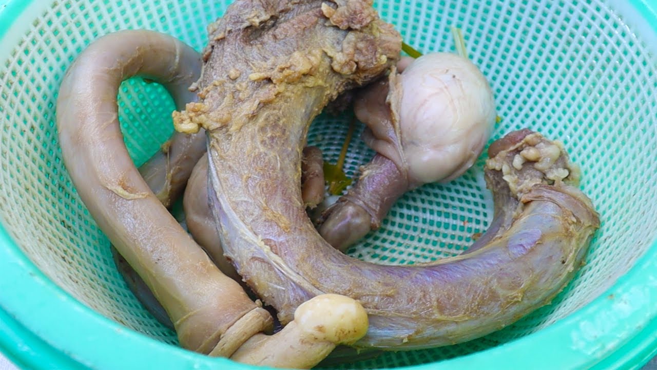Bizarre Food: Cooked Whole Bull Testicles For Dinner