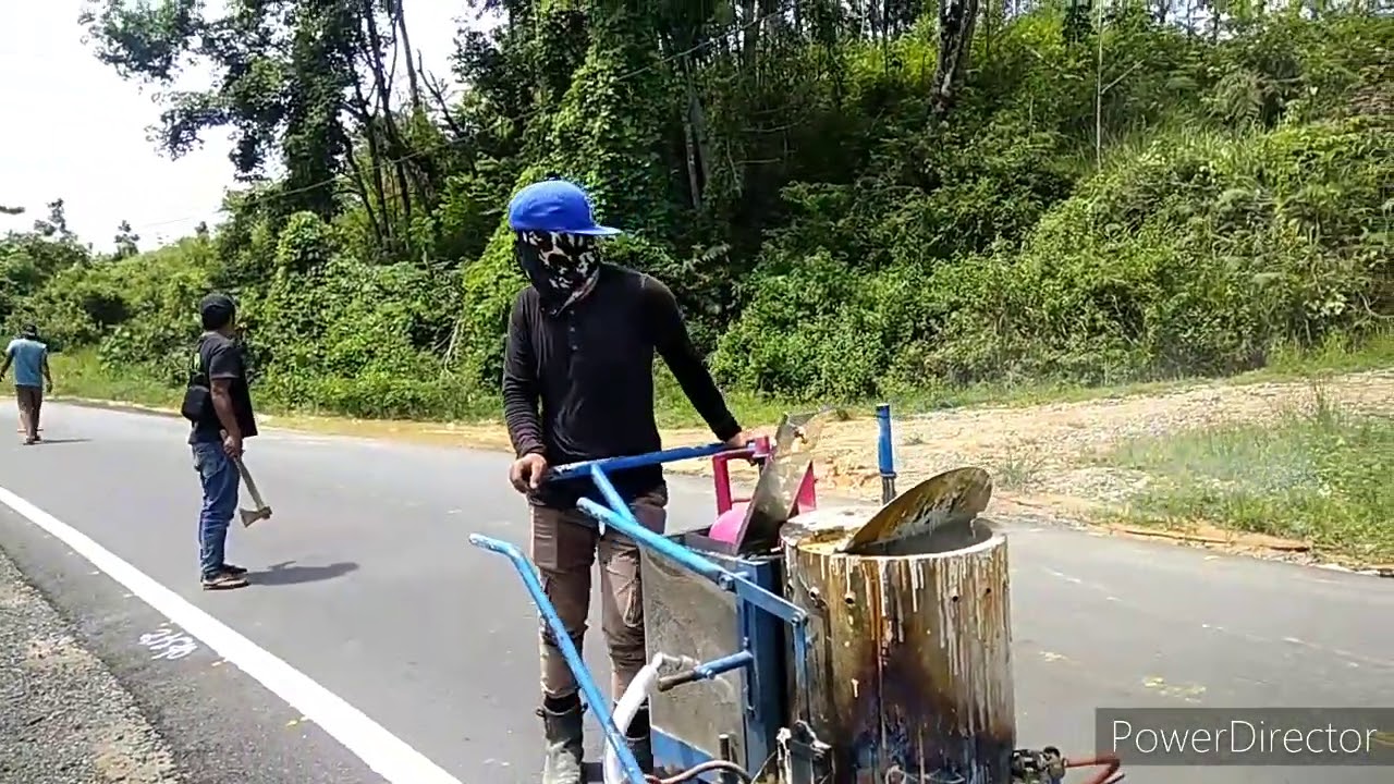 Cara membuat marka jalan menggunakan alat manual