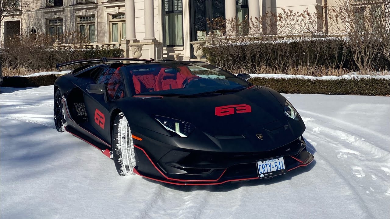 Brand new $1,000,000 LAMBORGHINI AVENTADOR SVJ 63 ROADSTER out in the snow