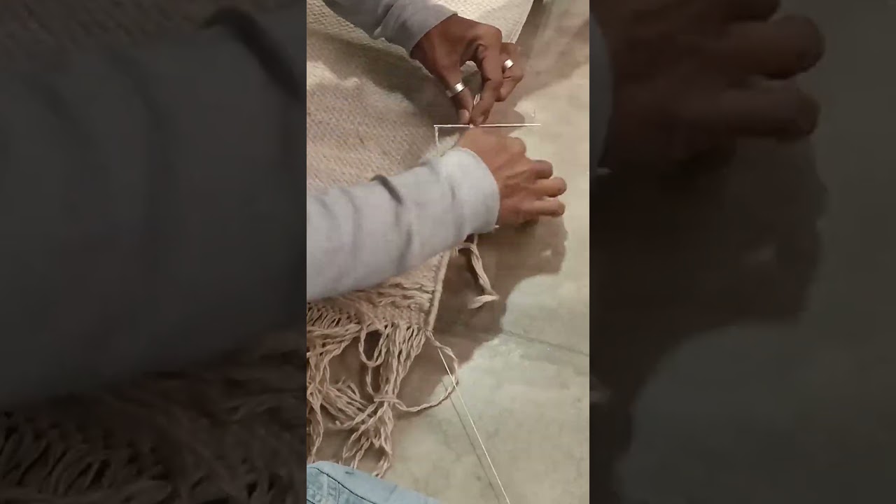 Binding handwoven rug. 