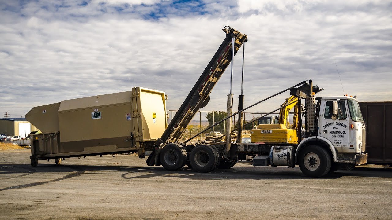 White Xpeditor Roll-Off Garbage Truck
