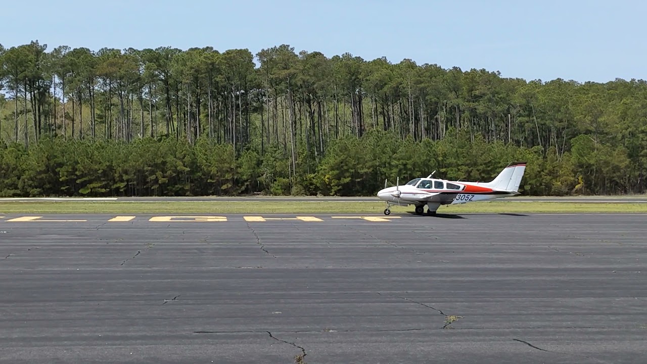 Baron 95-55 Taking Off From First Flight Airport