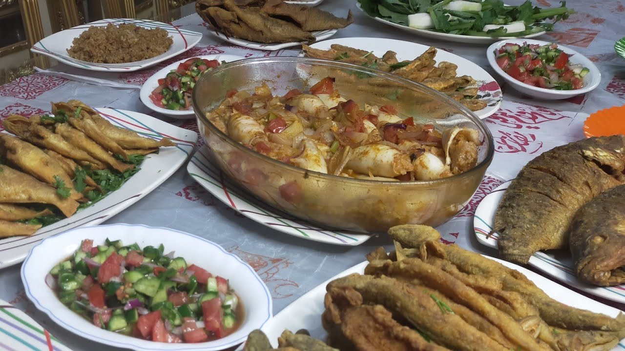 #اكله سمك / طريقه عمل كاليماري محشي سي فود مع شويه اسماك روعه