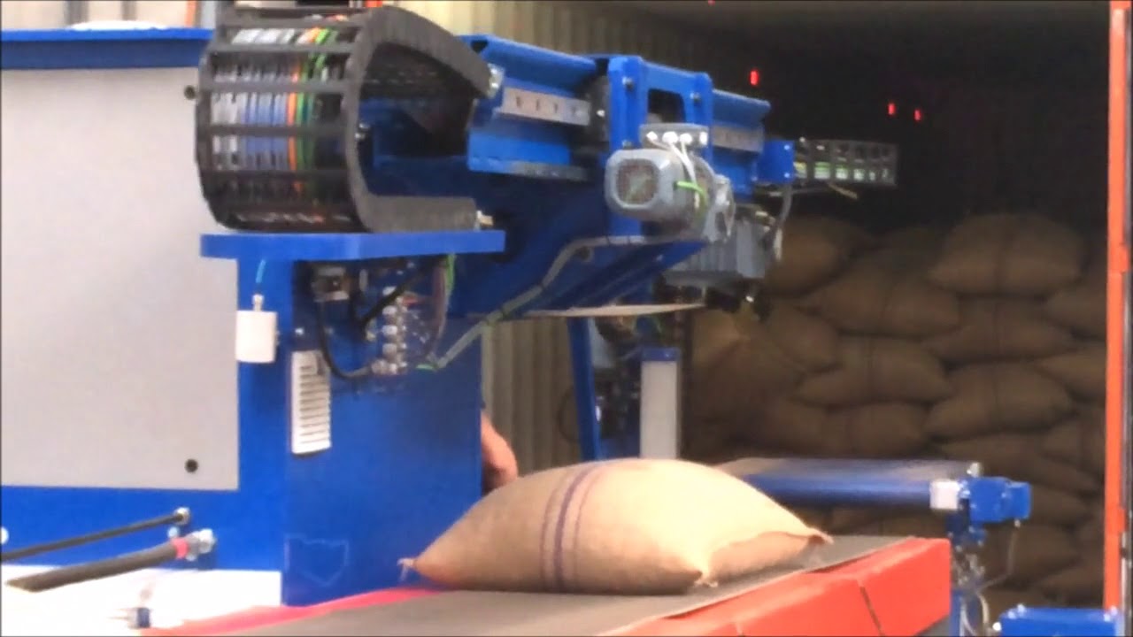 Semi-automatic heavy jute bag unloading from a container with the Copal C2 system.