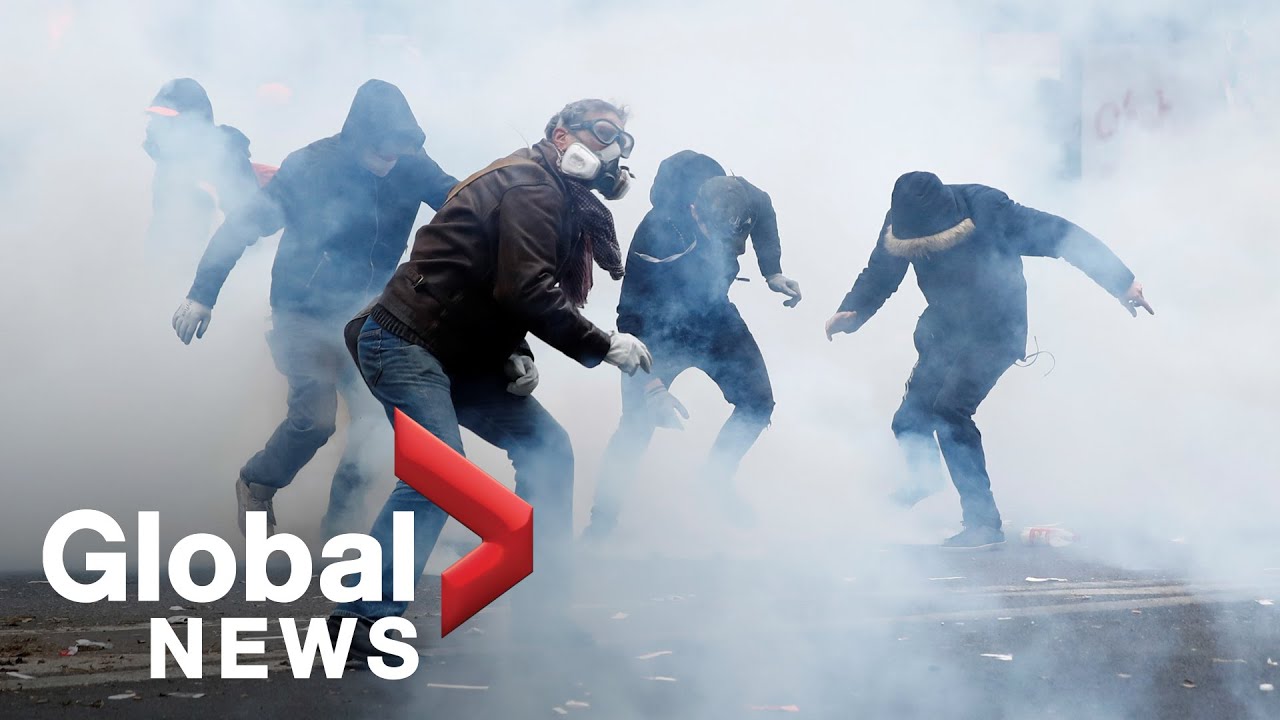 French police fire tear gas at protesters as strike over pension reforms turn violent
