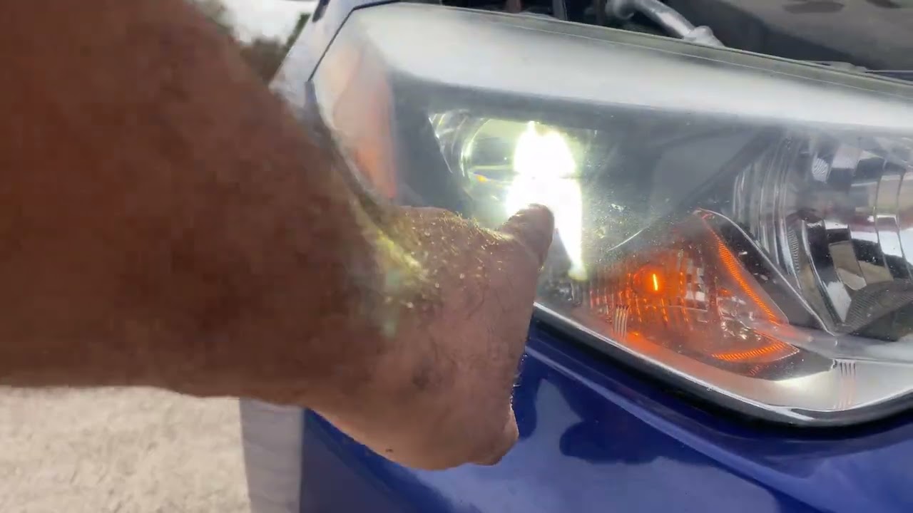 Toyota Corolla headlight light bulb replacement (AUXITO)