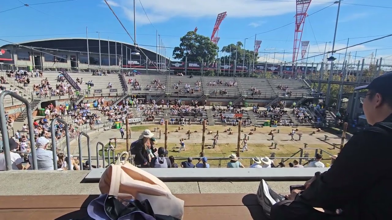 Relaxing & Sitting to watch the Wood Chopping at the Easter Show event