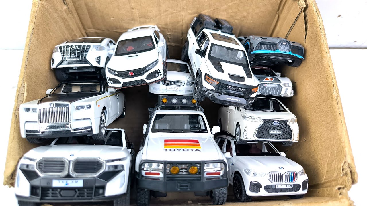 Box Full of Model Cars -Mazda Mx5, Koenigesgg Jesko, Lamborghini Scv12, Byd Yang Wang U8, Toyota Car