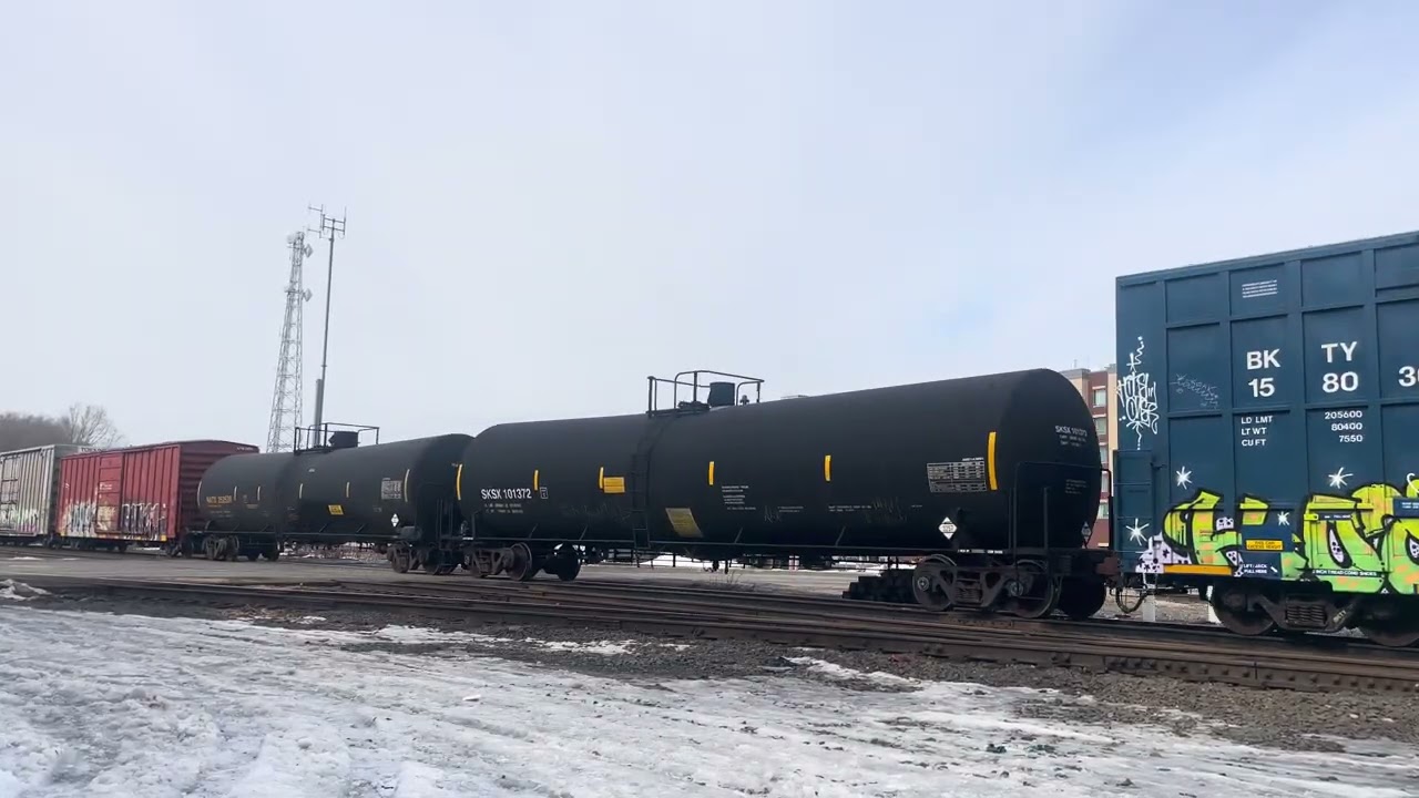 CSX M332 clears Muncie with CSXT1776(Spirit of Our Arm Forces) as the mid-dpu