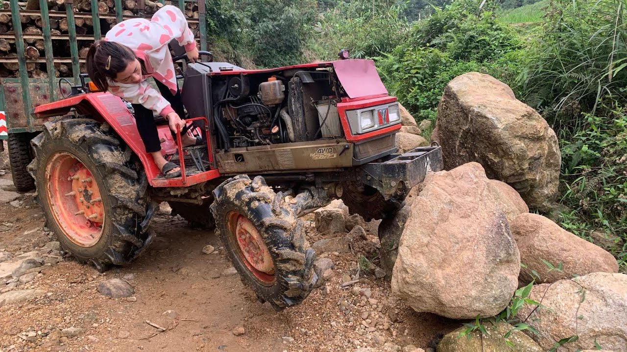 The lumber truck lost control and crashed into a large rock which scared me a lot.