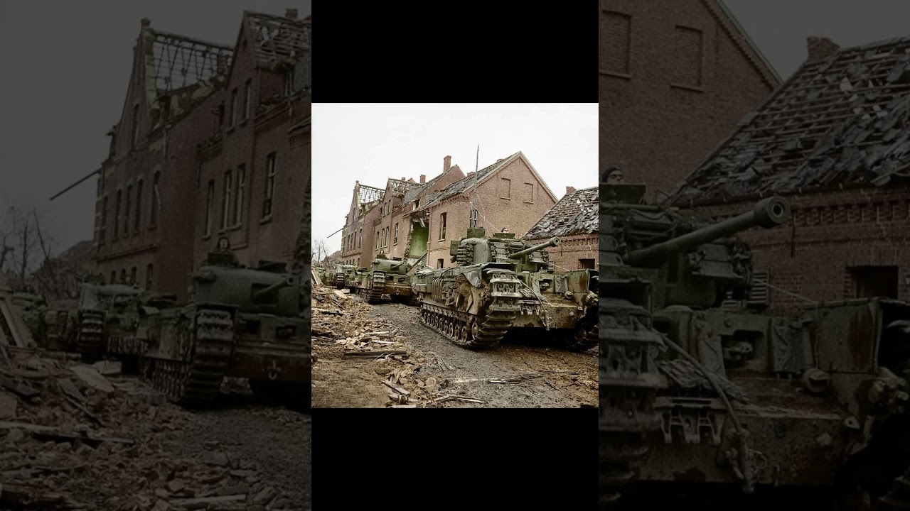 Churchill tanks of the 6 Guards Tank Brigade advancing along a heavily damaged street in Kleve. 1945