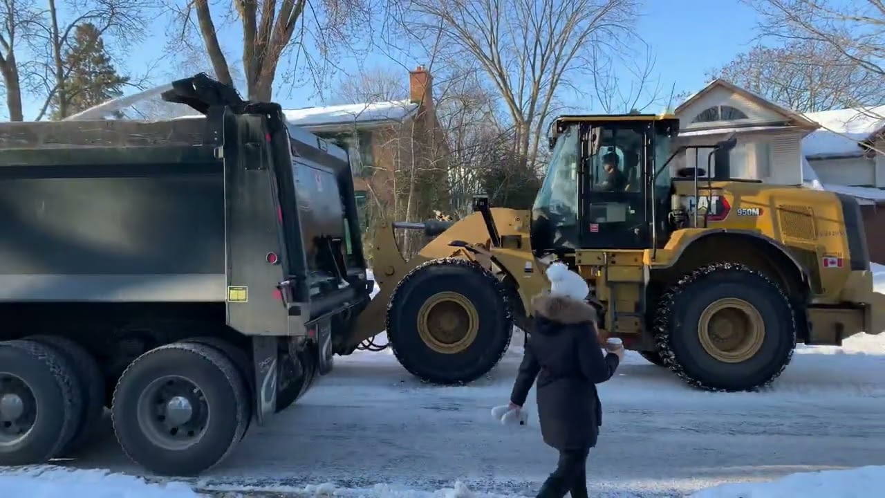 Morning snow bank removal with in cab view