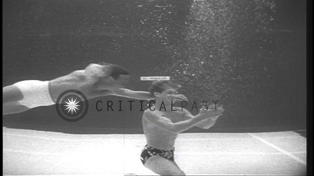 Dutch Smith and Bill Lewin during an underwater wrestling bout at Mirador Hotel i...HD Stock Footage