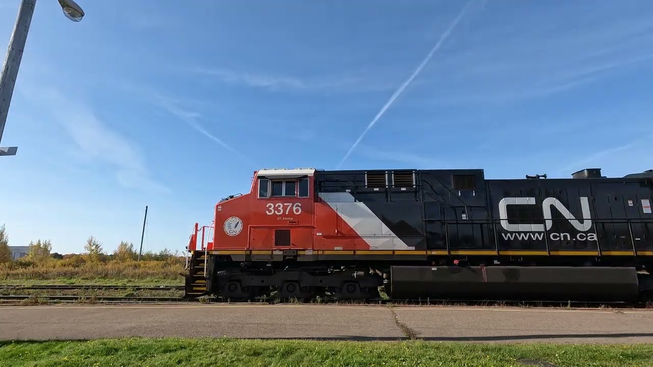 [4K] CN 507 lite power passing the Amherst station - October 2024
