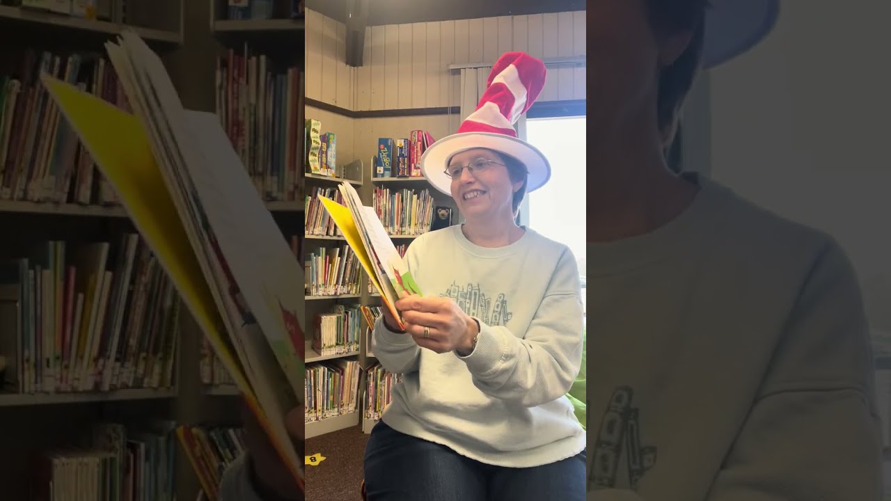 Library lady reads Fox in Socks
