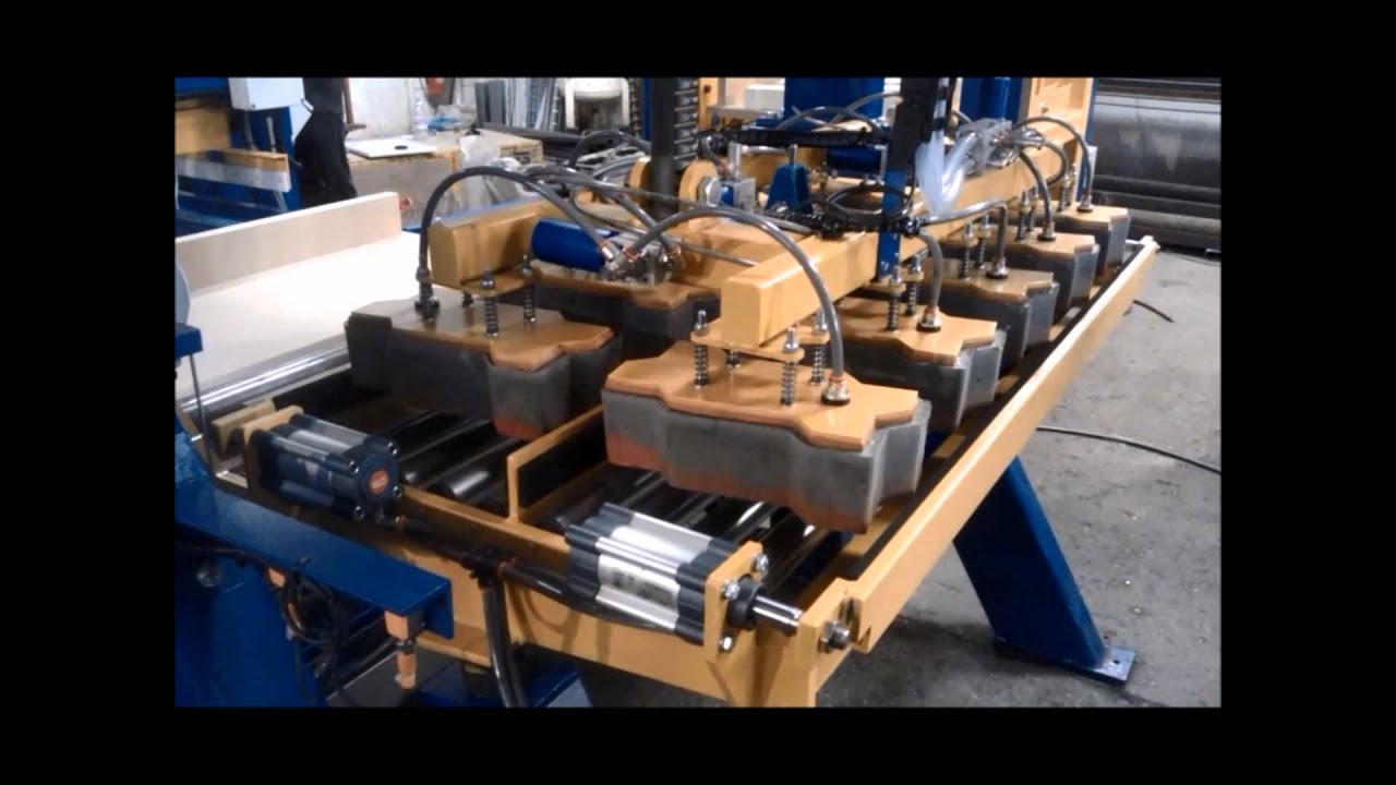 VACUUM DEMOULDING PAVER BLOCKS