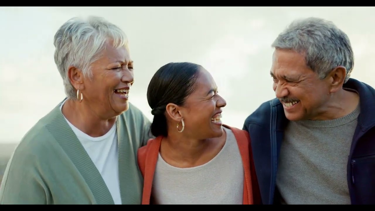Laughing, beach and woman with her senior parents on a family, tropical and island holiday