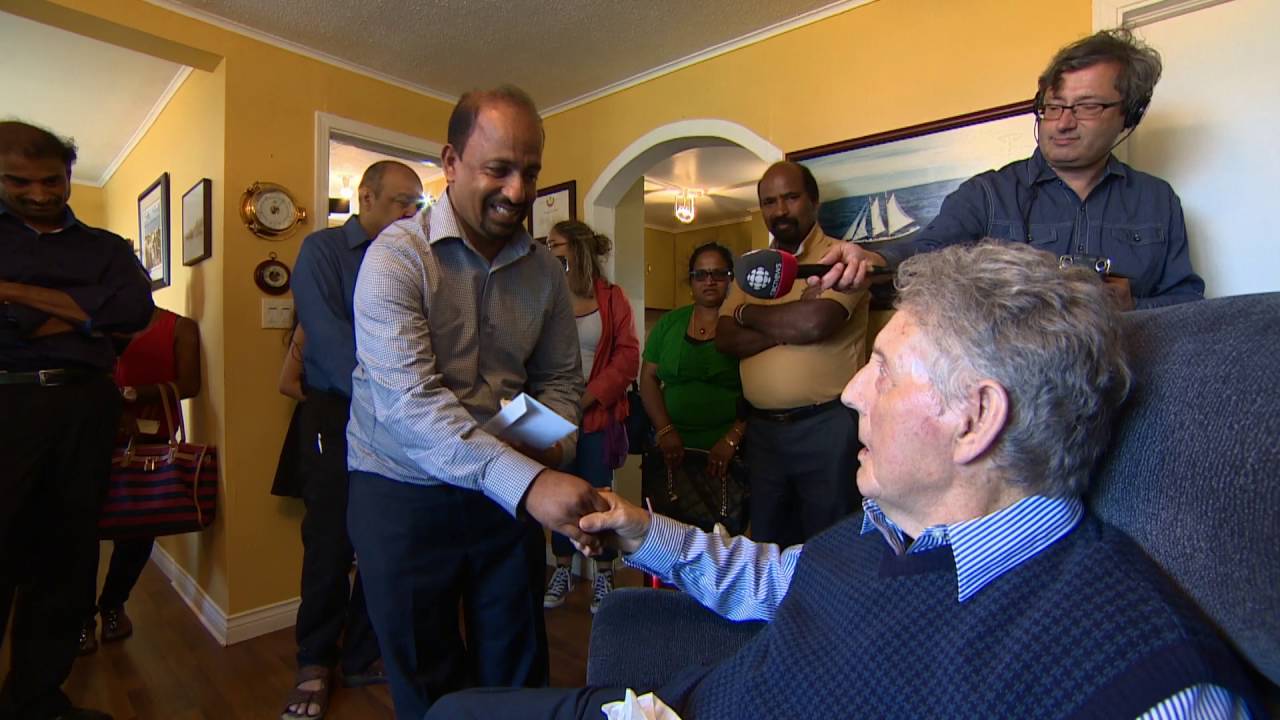 Tearful Tamil reunion with rescuers in Newfoundland