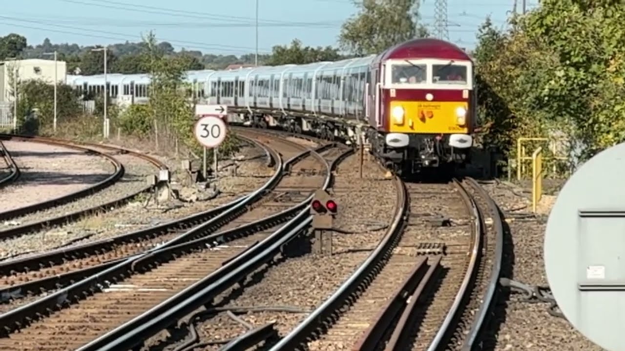 69009 Western Consort drags 701026 through Redbridge from MOD Marchwood to Wimbledon