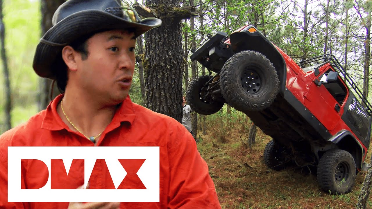 Survivalists Use Tree To Suspend Car & Fix The Undercarriage Of Off-Road Vehicle | Car vs Wild