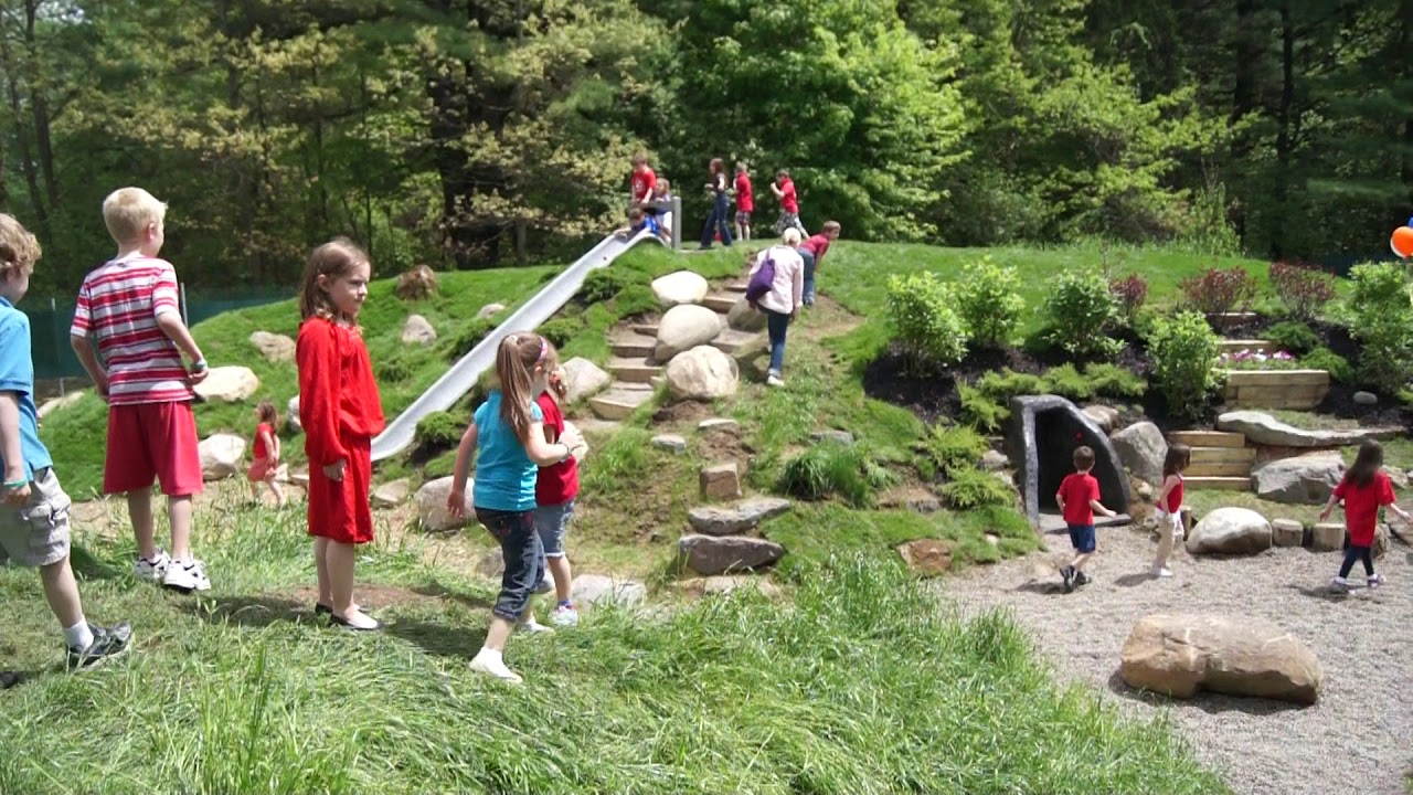 Kids playing in a new Natural Playground