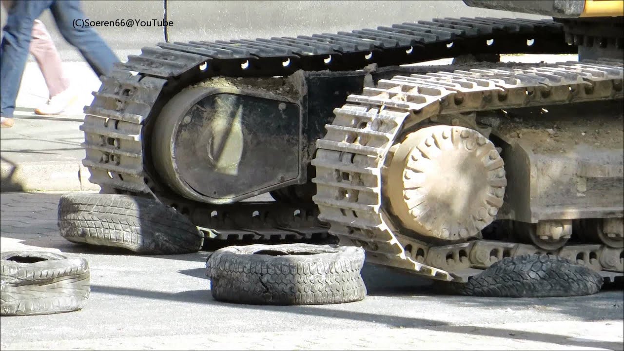 Kettenbagger CATERPILLAR 320E f&auml;hrt auf Reifen - Soeren66