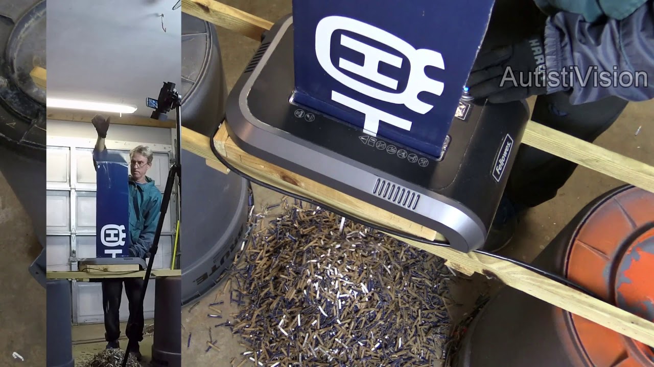 Shredding a whole weedeater box in a paper shredder Satisfying!