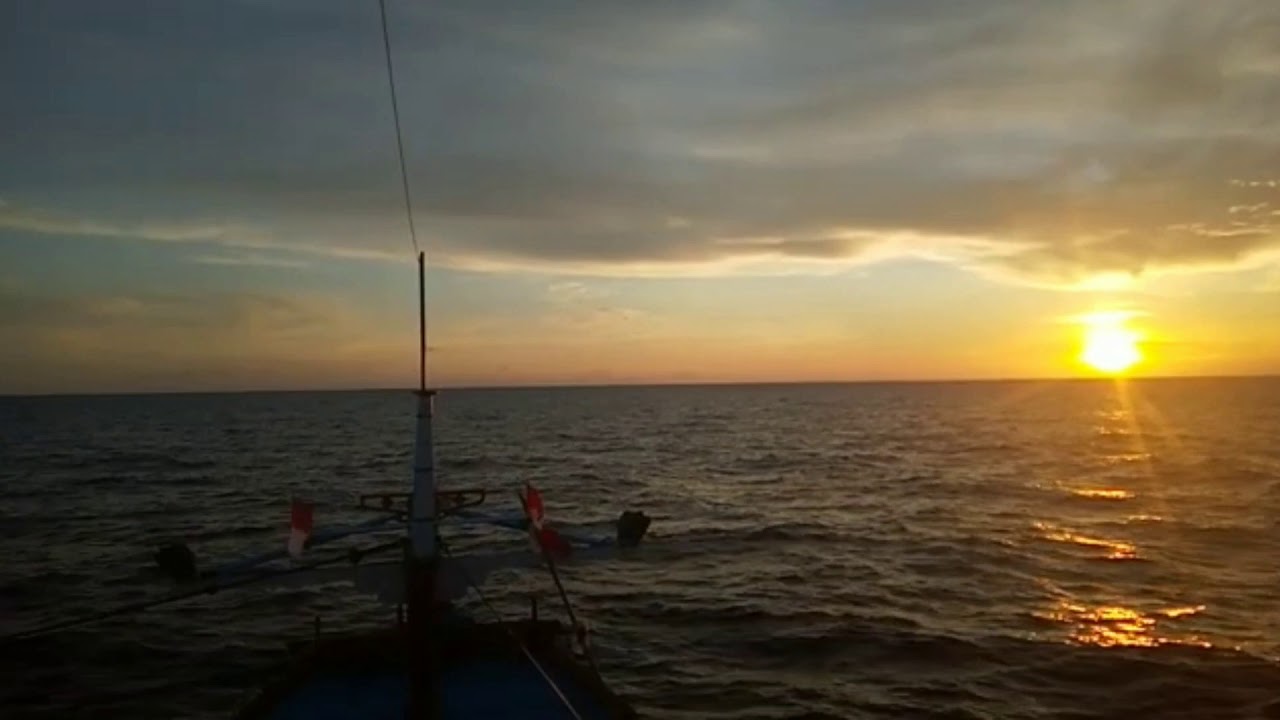 Ship Travelling in a beautiful evening | enjoying that beautiful sunset moment from ship