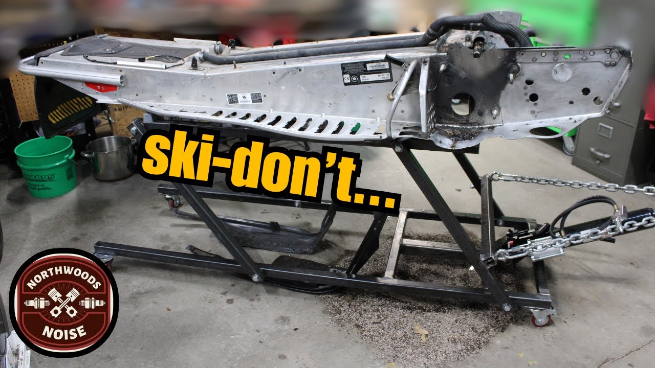 Rebuilding a crashed snowmobile from the ground up. Straightening the chassis and bulkhead.